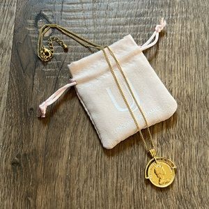Uncommon James coin necklace